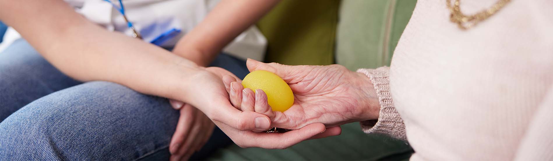 Occupational Therapist helping elderly patient