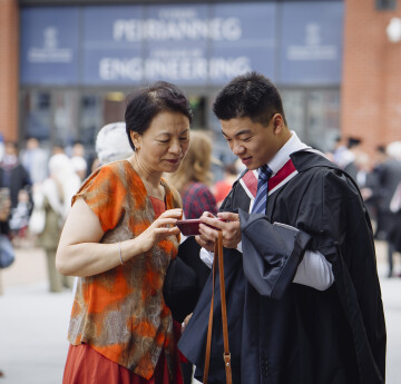 Student and parent at graduation