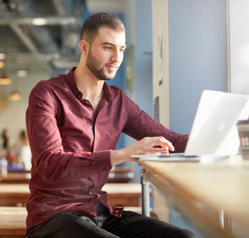 student working on a laptop