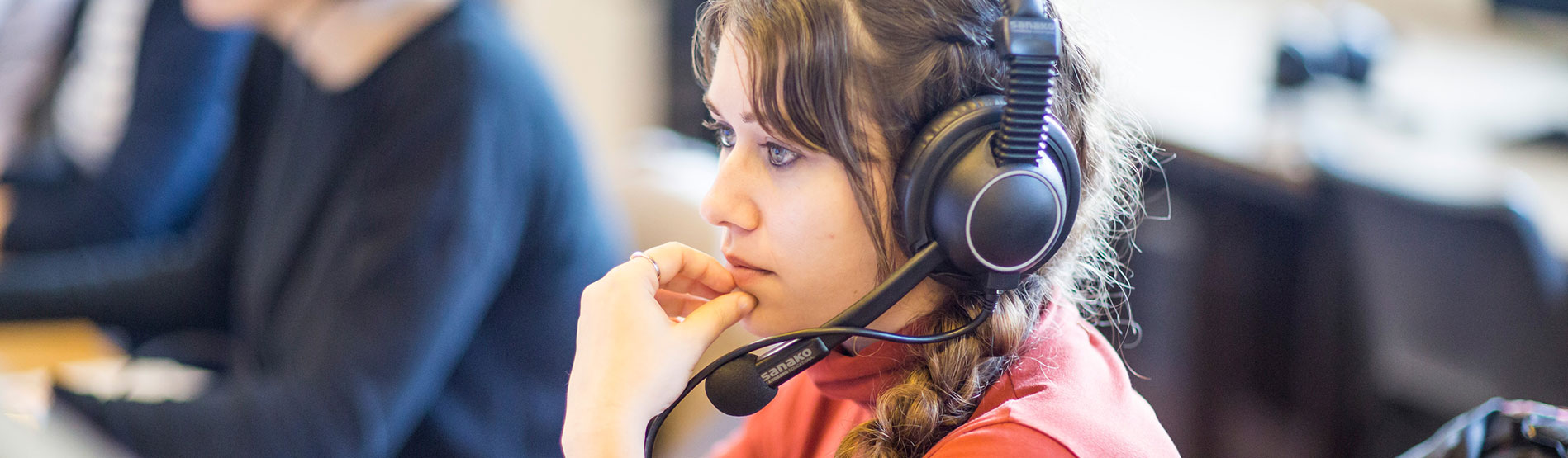 A student in the translation and interpreting lab