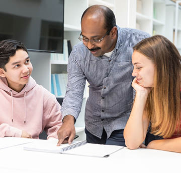 lecturer helping students