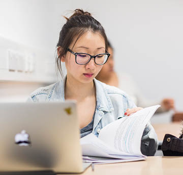 student working on a laptop