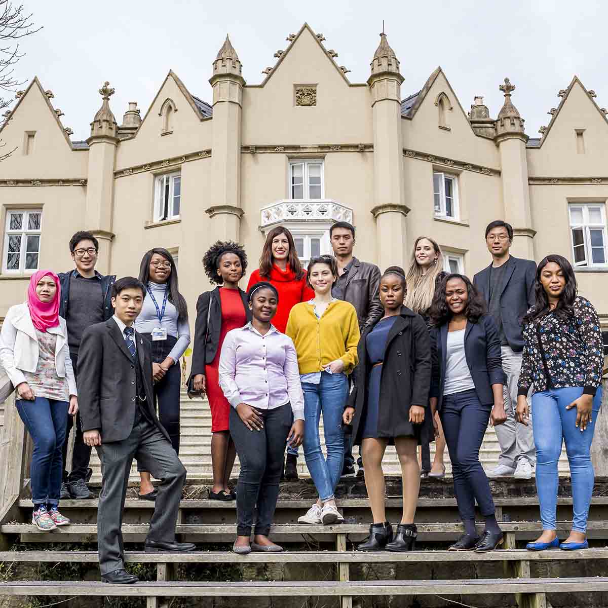 students sitting on steps