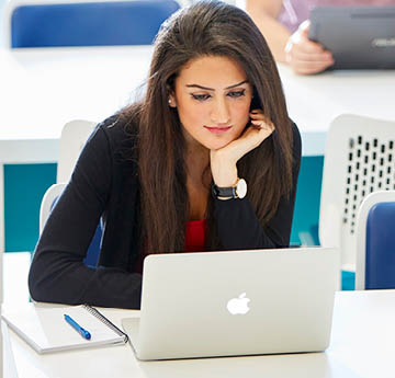 student working on laptop