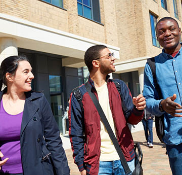 three students walking