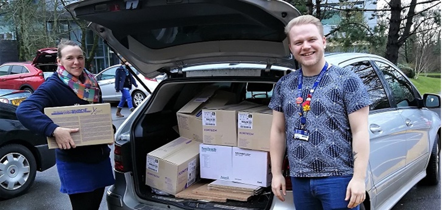 University staff loading up medical supplies for Singleton Hospital