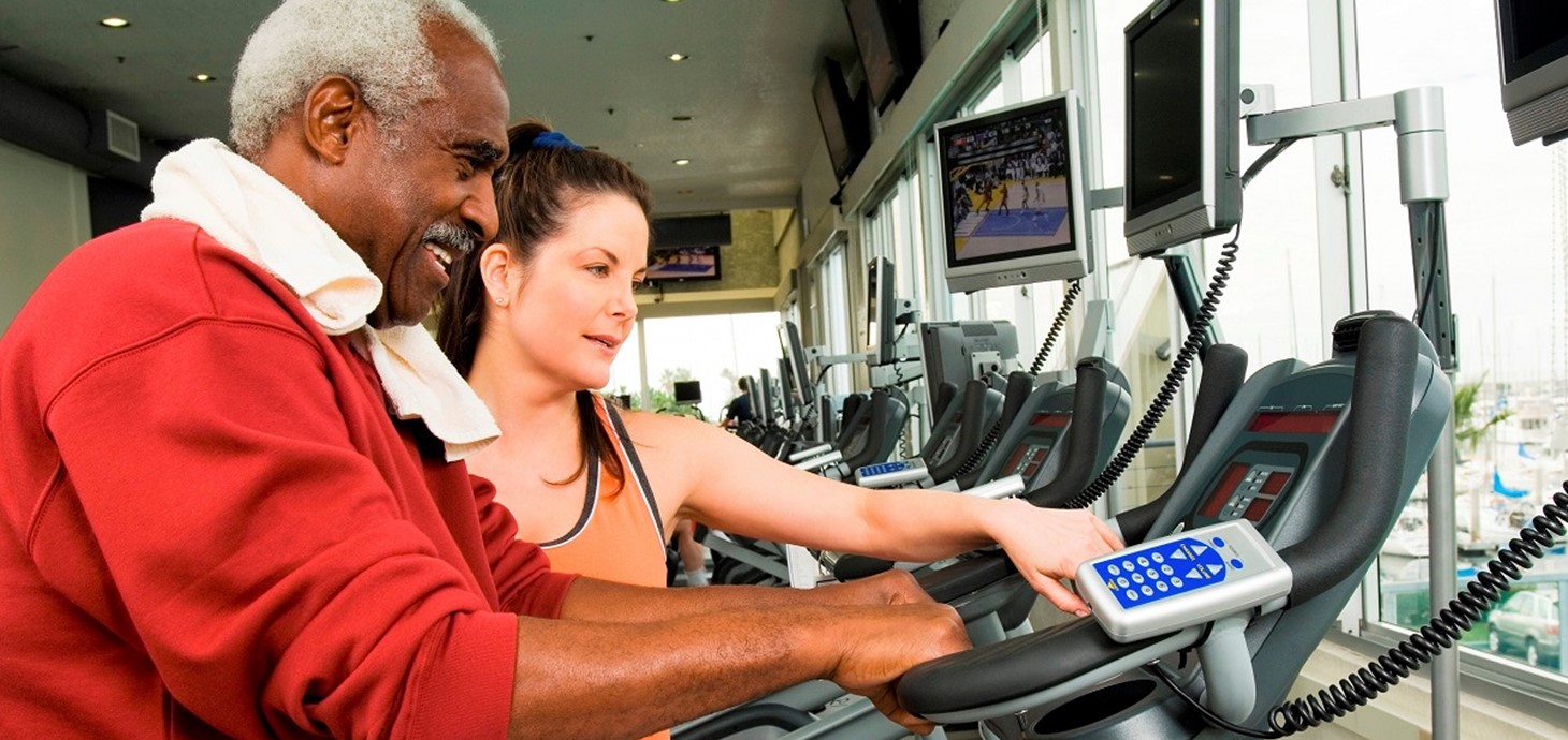 Man on exercise bike: physical exercise and improving activity levels are central parts of cardiac rehabilitation, which aims to boost the health and fitness of people with heart problems. 