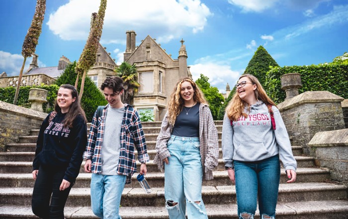 A group of students walking outside Singleton Abbey