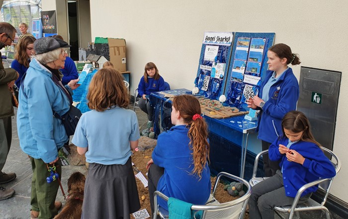 Pupils from Tavernspite CP School speaking to members of the public about what they’ve learnt.