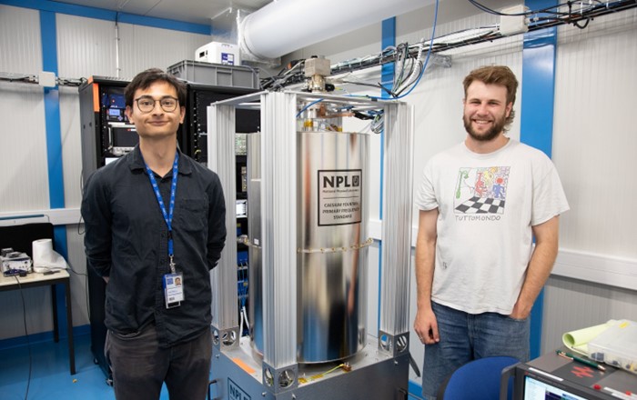 Swansea University researchers Joos Schoonwater and Edward Thorpe-Woods with the new caesium fountain. Credit: Stefan Eriksson.