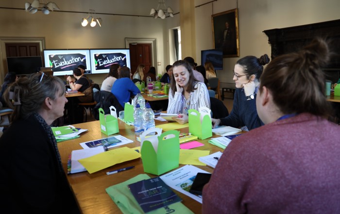 A group of students working during a session at the leadership conference.