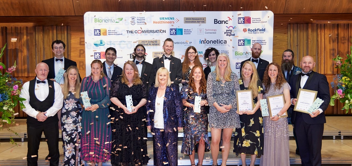 The winners of the Research and Innovation Awards pictured onstage at Swansea University’s Great Hall.