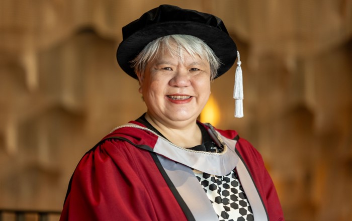 Verena Tay in her cap and gown as she celebrates her graduation from Swansea University.