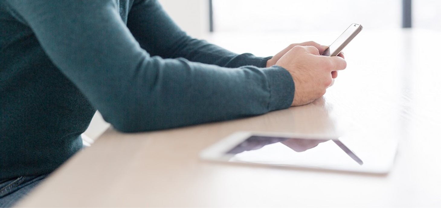 Mobile phone and tablet on a desk - technology can keep going 24/7, but we aren't meant to, says Professor Judith Lamie.