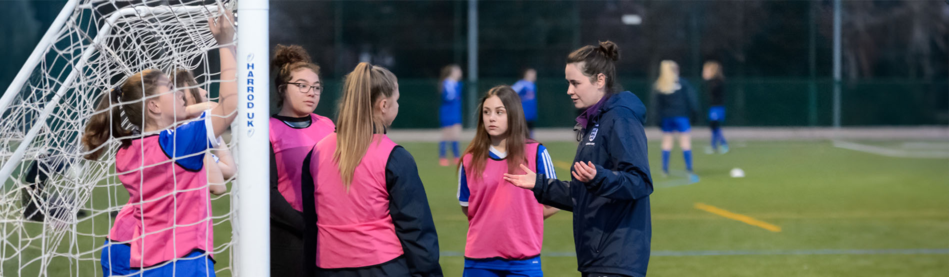 Girls playing football