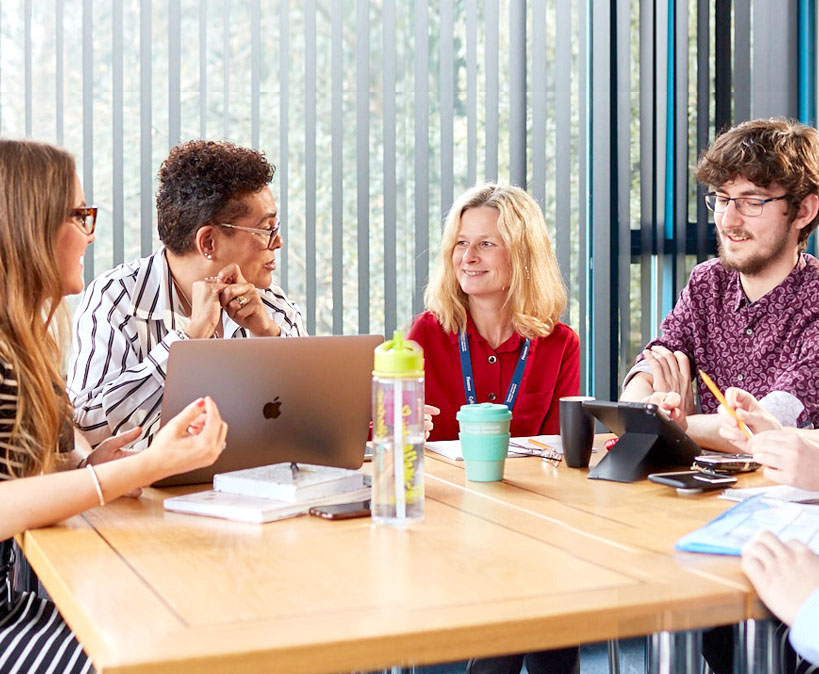 staff in a meeting