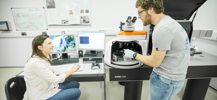 Equipment in the centre for nanohealth lab with a male and female student