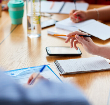 image of people making notes