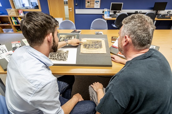 A PGR student discussing work during a one to one appointment with an expert