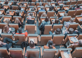 birds eye view of people at conference