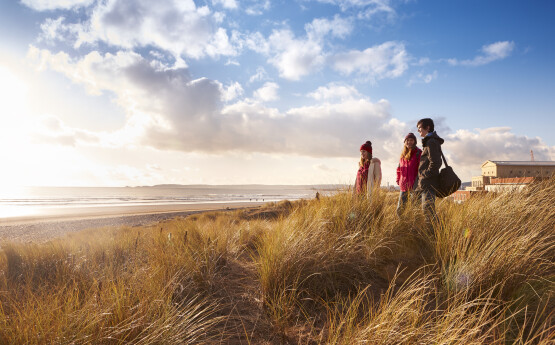 Students on Bay Campus Beach