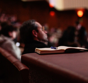 A lecture theatre and a notebook