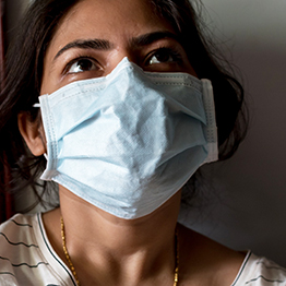 Teenager wearing COVID mask