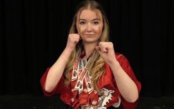 Sports scholar, Charley Davies, with her four medals around her neck following the WKU World Champs