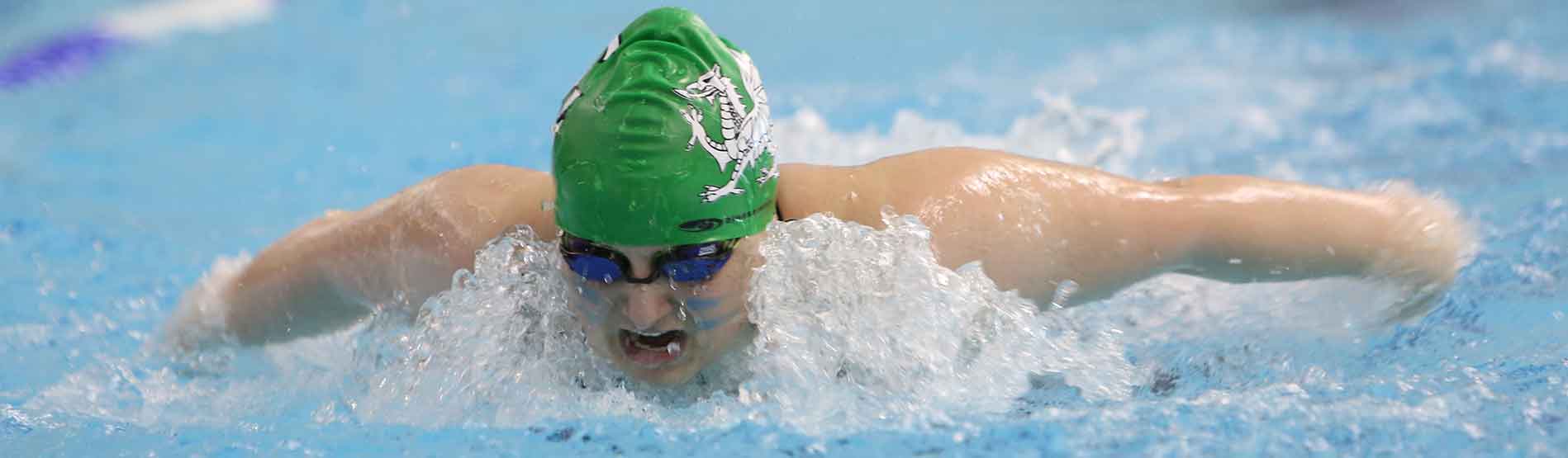 Swansea University swimming team member doing butterfly