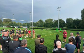 PDC Players taking part in a coaching session led by the Welsh Rugby Union 