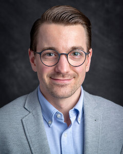 Headshot of Dr Lukas Helikum