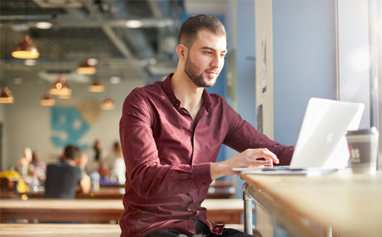 student on his laptop