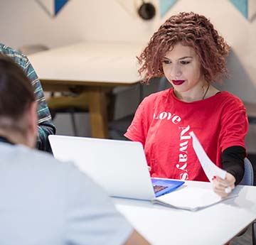 A female student working on a laptop