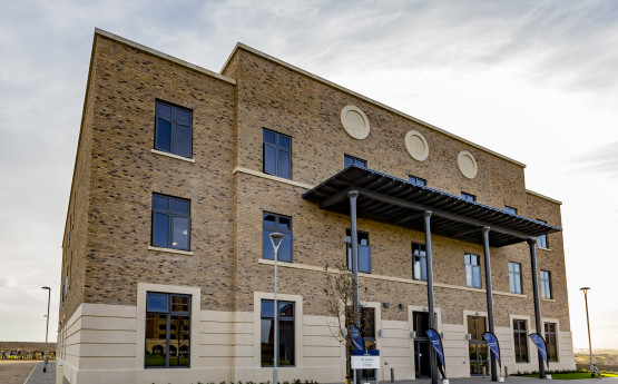 Outside the main entrance of The College.