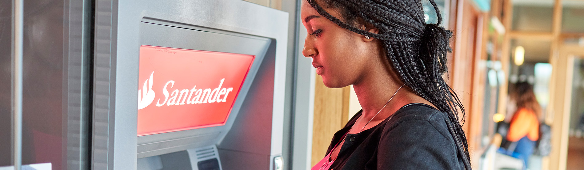 Student at ATM machine.