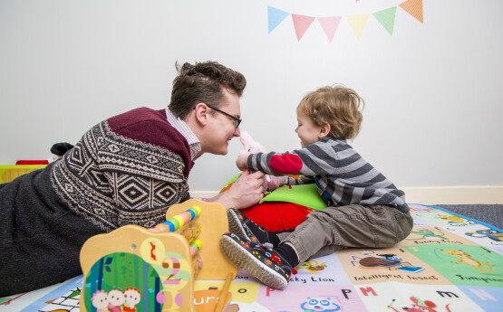 Adult and Child playing