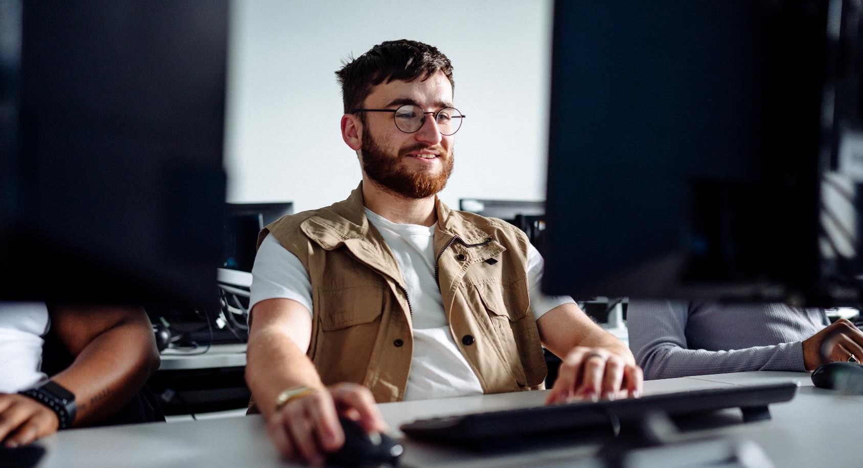 Student looking at a computer screen.