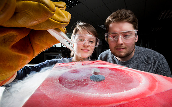 Science students doing an experiment.