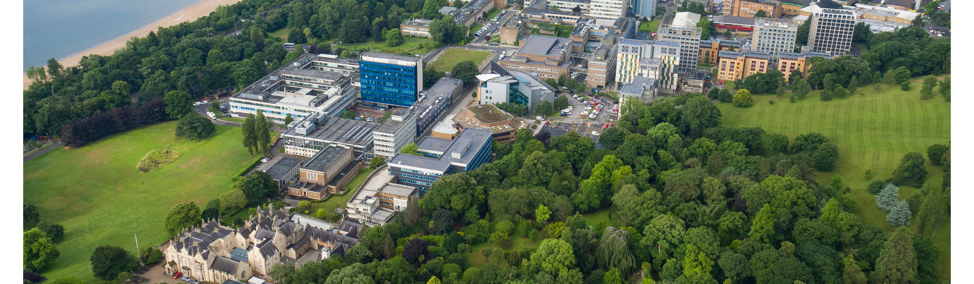 Ariel image of Singleton Campus with the beach