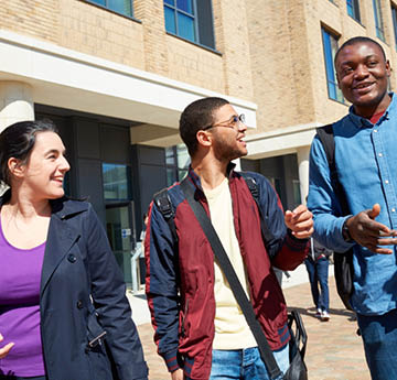 Three students walking