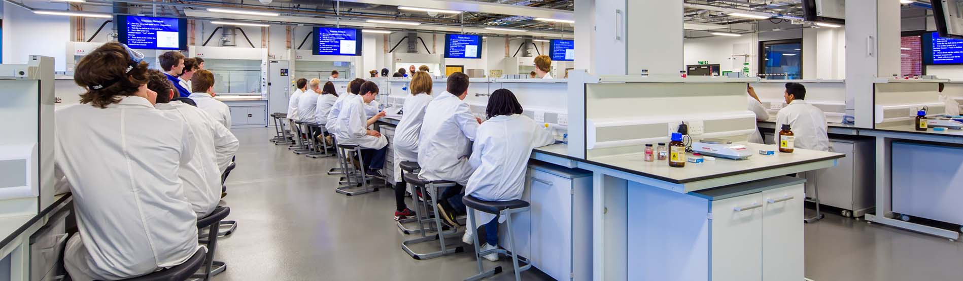 students in a chemistry lab