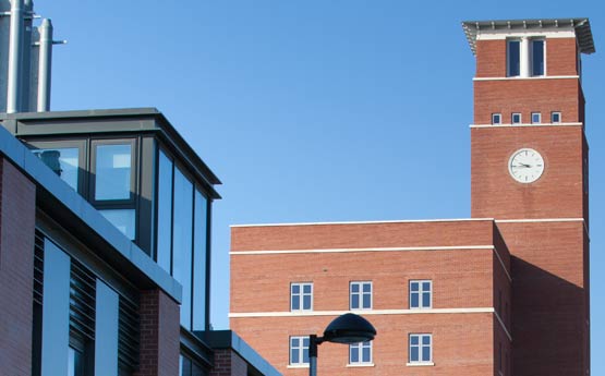 Exterior of Bay Campus accommodation and clock tower