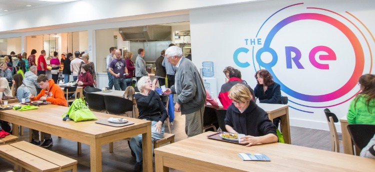 Visitors to the Bay campus open day eating in The Core