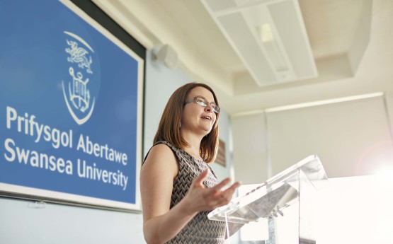 Staff member giving a presentation 