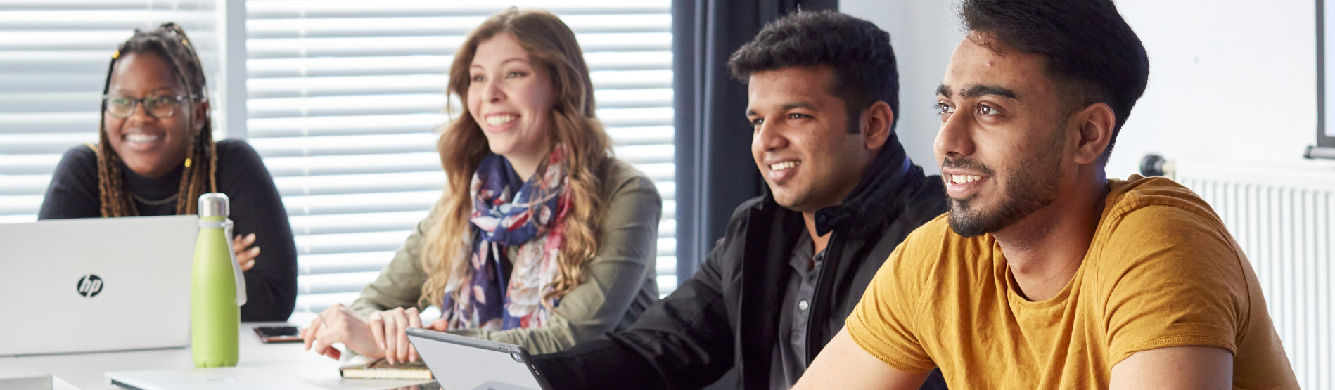 Students in a casual, learning setting.