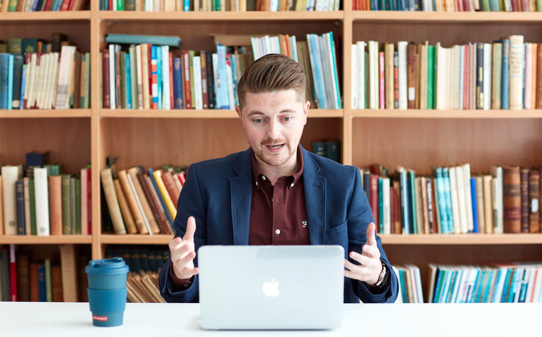 A staff member giving an online lecture